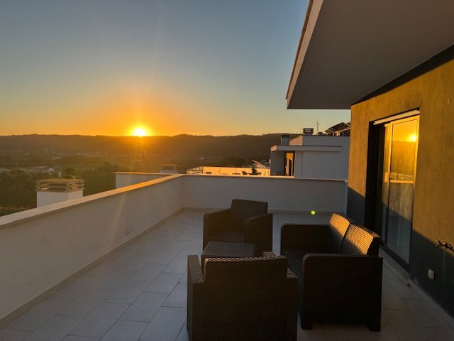 Zonsondergang vanop Casa Perola